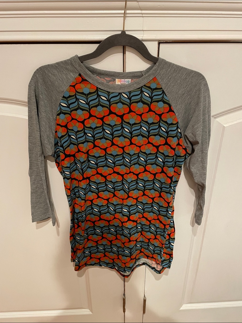 LuLaRoe Grey Raglan Tee with Red and Blue Floral Pattern